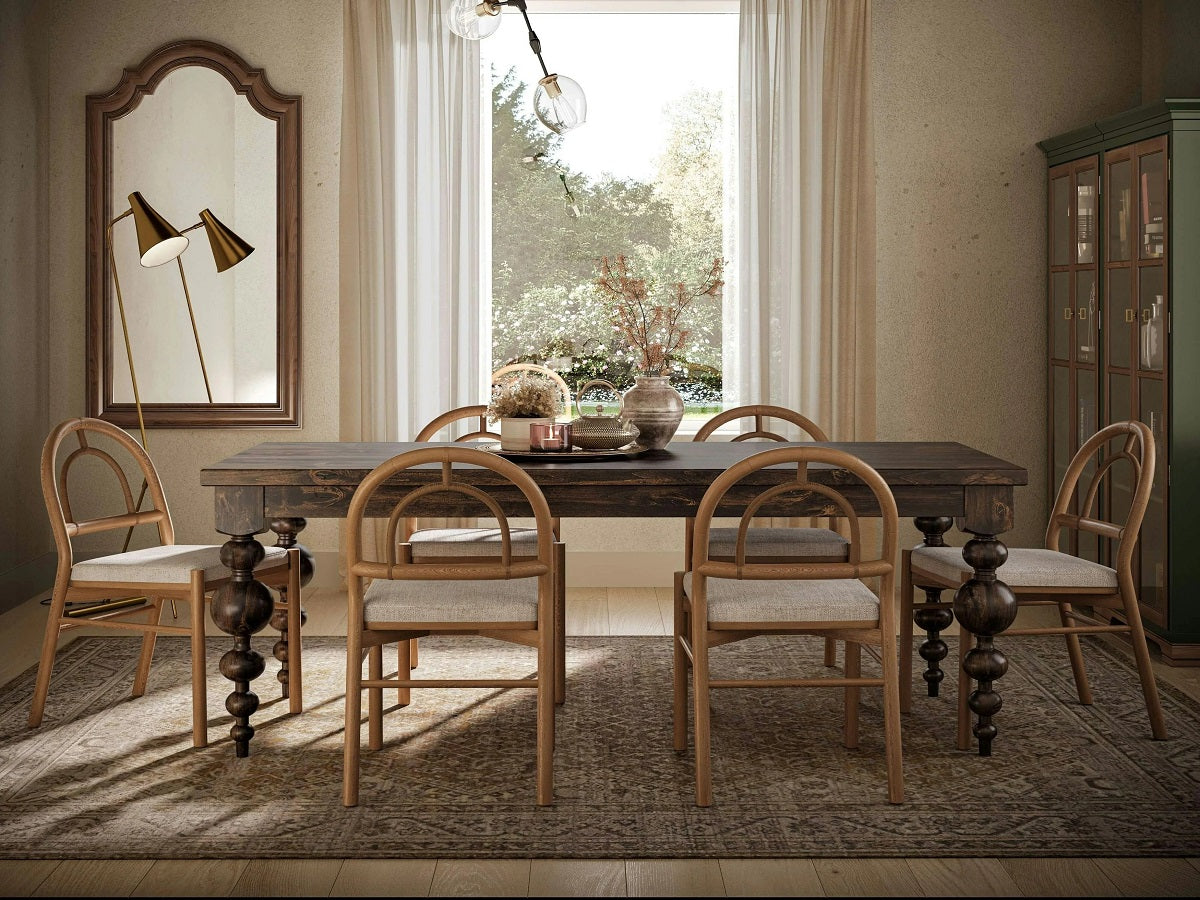 Rectangular solid wood dining table with six chairs in a classic dining room, illustrating seating capacity for rectangular tables.  