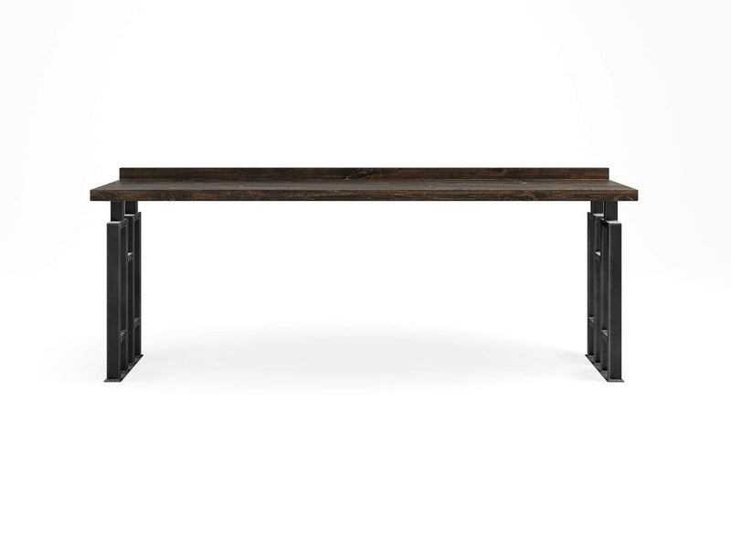 Introducing the Clark Sofa Table - Tobacco by James+James: A modern table with a sleek dark wooden top and sturdy black metal legs. This table boasts an industrial design with a minimalist aesthetic, featuring side supports that provide ample open space underneath. Set against a plain white background, it’s perfect for any contemporary interior.