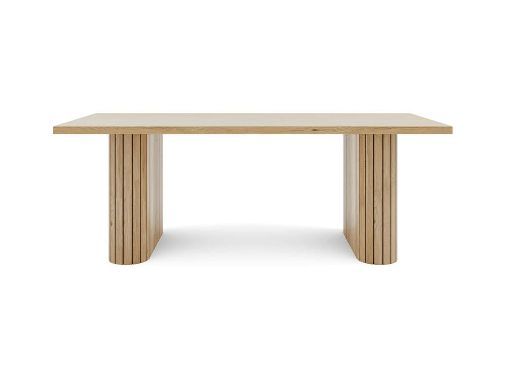 Introducing the James+James Fern Dining Table - Satin, a rectangular wooden table with a simple and modern design. It features a smooth, flat top and two sturdy, vertical paneled legs positioned at each end for solid support. The table boasts a natural wood finish and clean lines.