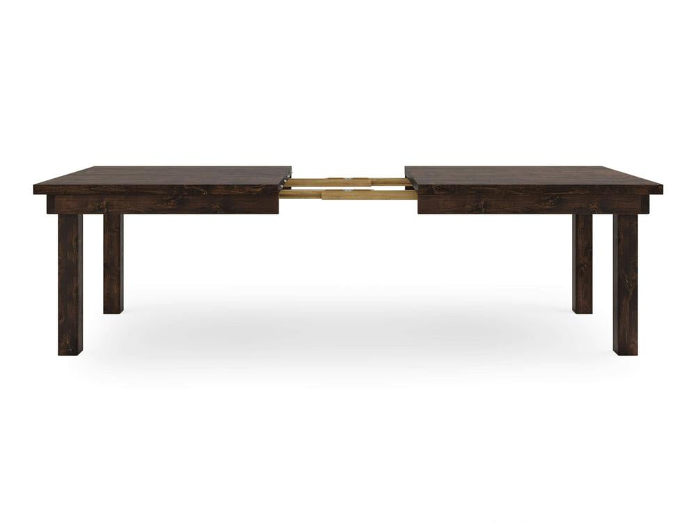 The Farmhouse Expandable Dining Table - Tobacco by James+James is a dark wooden dining table with clean lines, shown with an extendable mechanism partially open in the center. The table features four sturdy legs and a rustic finish, offering a blend of functionality and modern design.