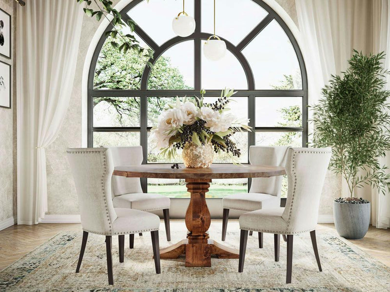 The Heirloom Round Dining Table - Tuscany by James+James features a pedestal base and elegant wooden design.