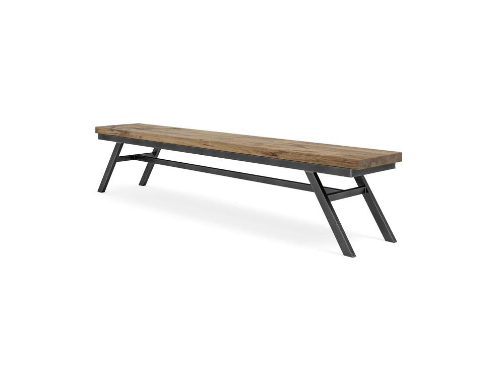The Fulton Bench - Harvest Wheat on Alder by James+James features a rectangular wooden seat and angled black metal legs in a modern industrial style, shown against a white background.