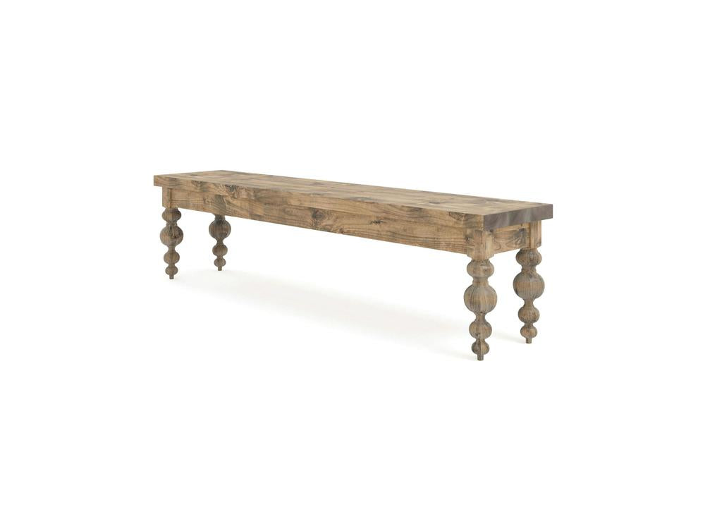 The Olivia Bench - Harvest Wheat on Alder by James+James features a rectangular wooden seat and four intricately carved, chunky legs, displayed against a white background.