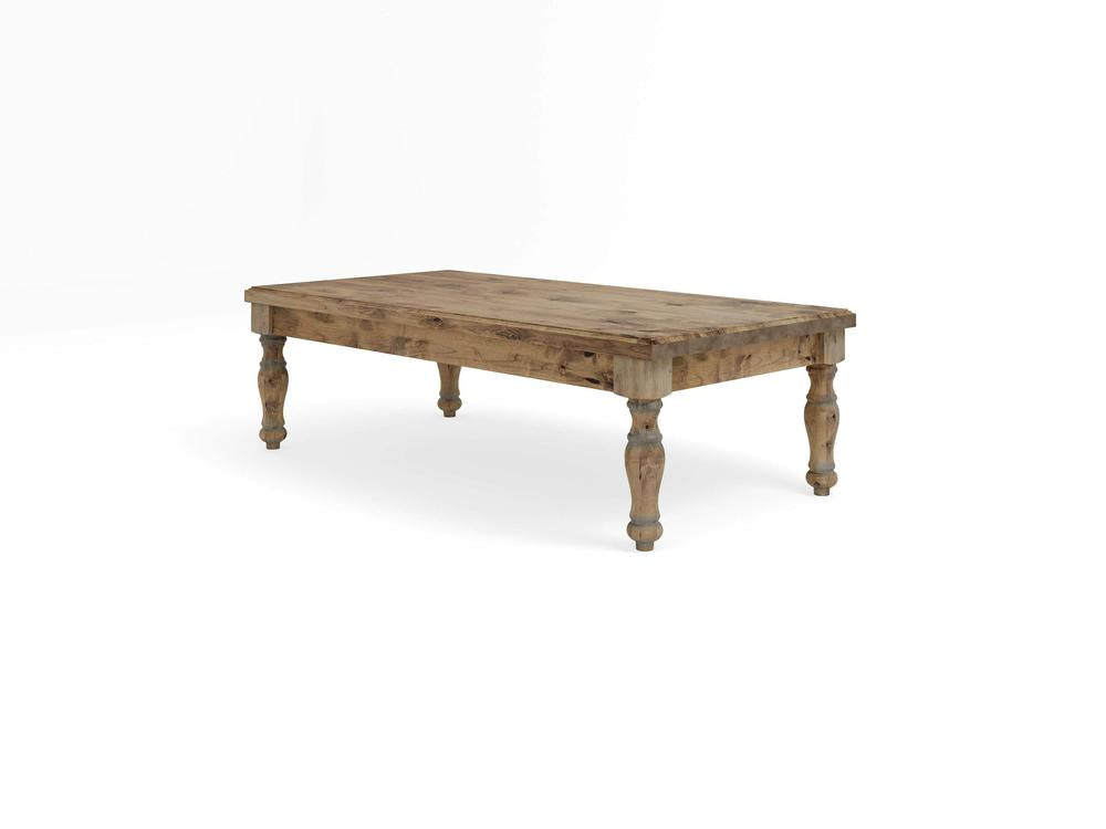 Product Description: The Abigail Coffee Table - Harvest Wheat by James+James features a wooden rectangular top and intricately carved legs, beautifully presented against a plain white background. The rustic finish emphasizes the natural grain of the wood, adding a touch of warmth and character.