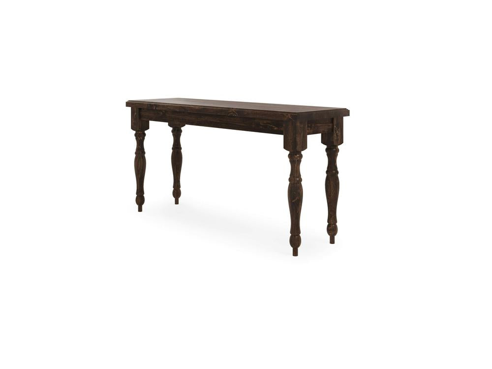 Introducing the Abigail Sofa Table - Tobacco by James+James: a rustic wooden table with a dark finish, featuring an elongated rectangular top and four ornate, turned legs with intricate details. This piece exudes a vintage and elegant appearance while boasting a sturdy and classic design.