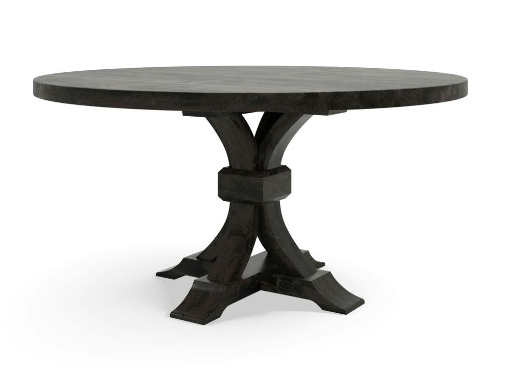 The Violet Round Dining Table - Charred Ember by James+James features a dark wooden, smooth top surface. It stands on a central pedestal supported by four curved, sturdy legs that converge in the middle and branch out at the base for added stability. The overall design is elegant and classic.