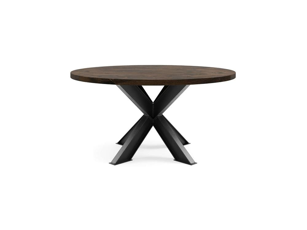 The Shiloh Round Dining Table - Tobacco by James+James features a dark brown wooden top and a black metal X-shaped base. This table boasts a modern and minimalist design, perfect for dining or decorative purposes. The wood surface is smooth and polished.