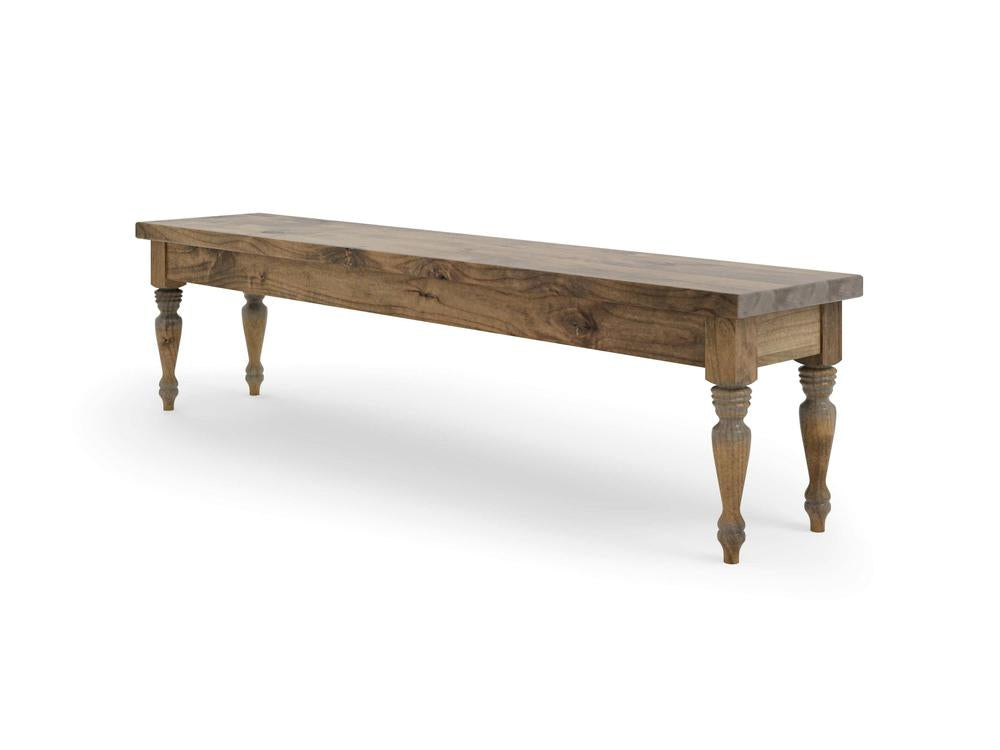 The Chateau Bench - Harvest Wheat by James & James features a rectangular seat with four intricately carved legs, set against a plain white background. It boasts a natural wood finish and rustic design.