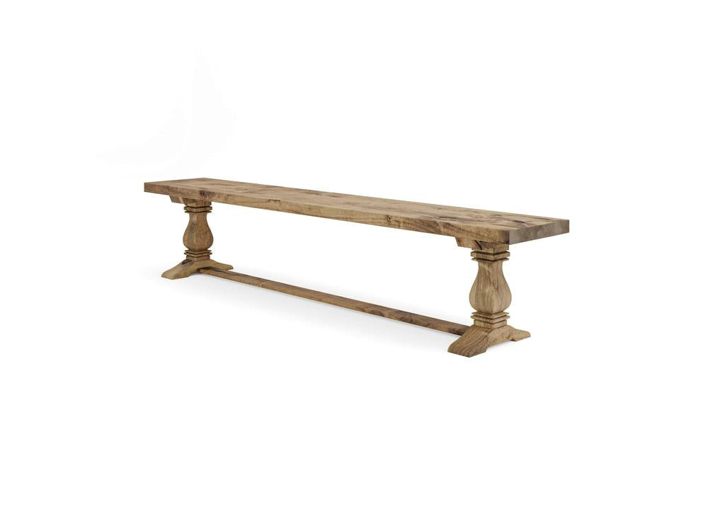 The James+James Heirloom Bench – Harvest Wheat on Alder features a rectangular wooden seat and decorative turned legs with a horizontal support beam, displayed against a plain white background.