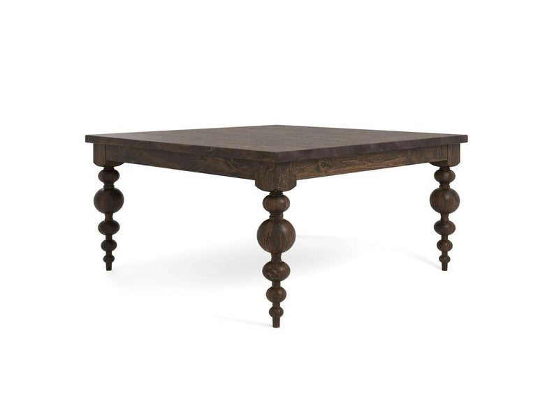 Introducing the Olivia Square Dining Table - Tobacco by James+James. This wooden table boasts a dark finish and showcases distinctive, thick turned legs with vertically stacked rounded shapes. Its traditional, rustic design is complemented by a clean look with no visible decorations on the surface or edges.