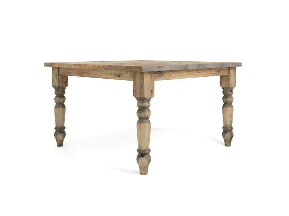 The Baluster Square Dining Table in Harvest Wheat by James+James is crafted from wood with a natural finish and features four intricately detailed, turned legs. This table offers a rustic yet sturdy appearance, combining a simple and classic design with a smooth surface and decorative legs.