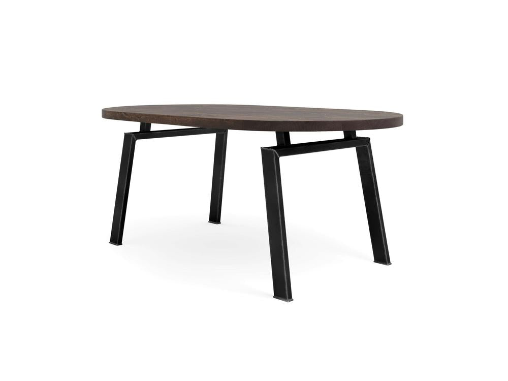 Introducing the Fulton Oval Dining Table - Tobacco by James+James, featuring a contemporary oval shape with a rich dark wooden top and elegant black angled metal legs. This design showcases a sleek and minimalist aesthetic ideal for modern homes.