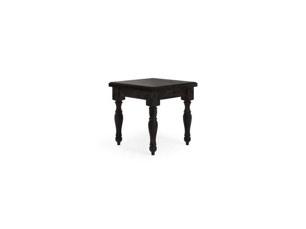 The Abigail End Table - Charred Ember by James+James is a small, square wooden table with a dark finish, featuring ornate, carved legs. The table has a classic, traditional design and stands alone against a plain white background.