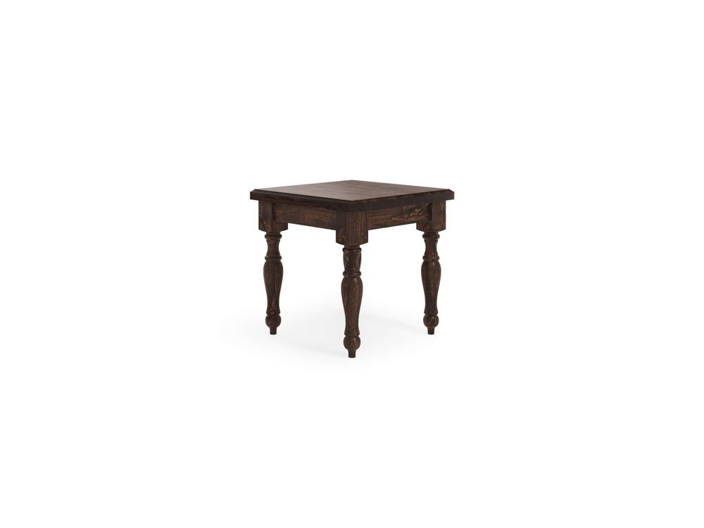 The Abigail End Table - Tobacco by James+James is a square, dark wooden side table adorned with detailed carvings along the edges. Featuring four intricately turned legs and a sturdy rectangular top, this table boasts a vintage, rustic design and stands alone against a white background.