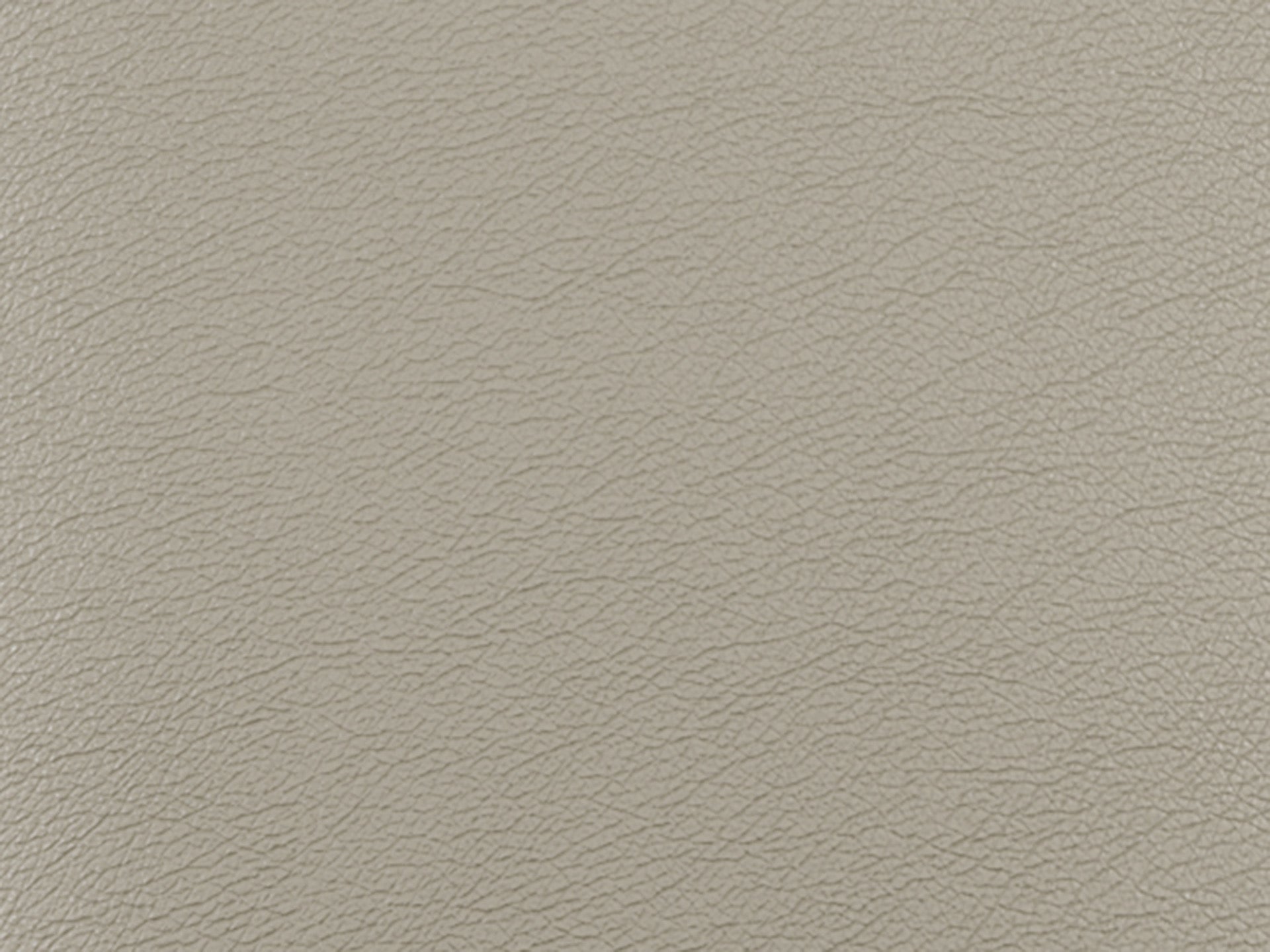 Close-up of Beige - Leather Swatch by James+James reveals a soft texture with subtle, natural grain and fine, irregular lines—ideal for relaxed interiors.
