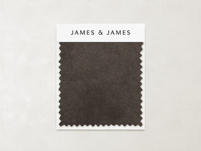 A dark brown rectangular "Mink - Mohair Swatch" with zigzag edges shows its natural texture, attached to a card labeled "James+James" at the top, set against a light background.