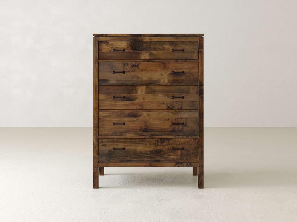 The Jensen Tall Chest by James & James is a vintage wooden dresser made from solid maple hardwood. It features five drawers with metal handles, and its rustic finish highlights brown tones and natural grain patterns, offering a timeless charm with modern design elements.