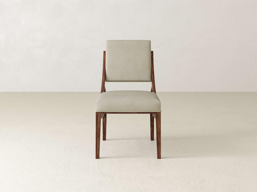 A set of two Quinn Dining Chairs by James & James, featuring fully upholstered seats and backs in Tuscany & Cream, stand ready to enhance any refined dining room with their elegant design.