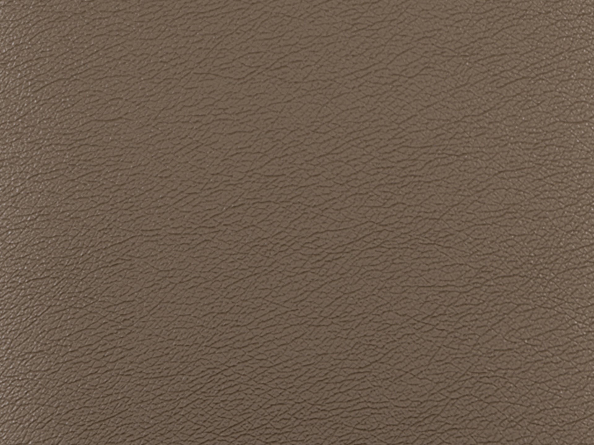 Close-up of Toffee - Leather Swatch by James+James, featuring cool-toned brown leather with a natural, slightly pebbled grain and subtle creases that highlight its supple, buttery texture.