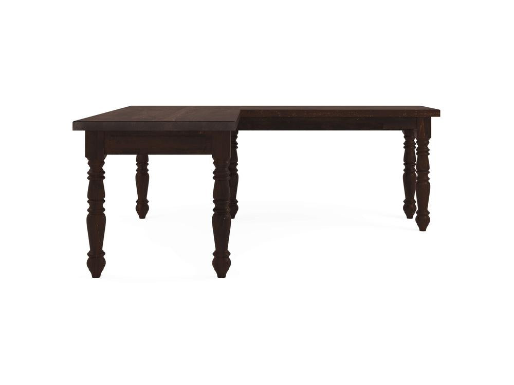 Introducing the Turned Leg Corner Desk - Tobacco by James+James: This desk boasts a rich dark wood finish with ornate, turned legs and an L-shaped design. It features a polished surface and classic styling that makes it ideal for both dining or workspace use, set against a plain white background.