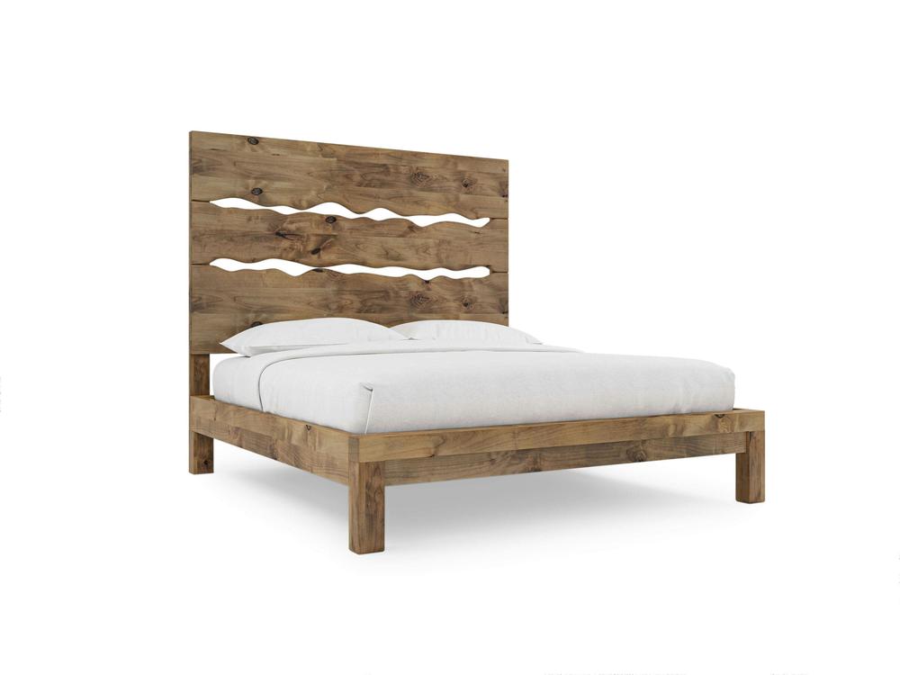 The James+James Live Edge Bed - Harvest Wheat on Alder features a tall rustic headboard with wavy cut-out patterns, displayed with a neatly made white mattress and bedding against a plain white background.