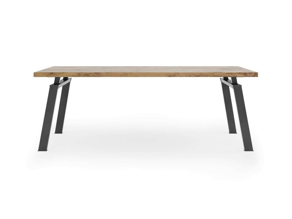 The Fulton Desk - Harvest Wheat by James+James is a rectangular piece with a thick, light-colored wooden top and angled black metal legs, set against a plain white background.