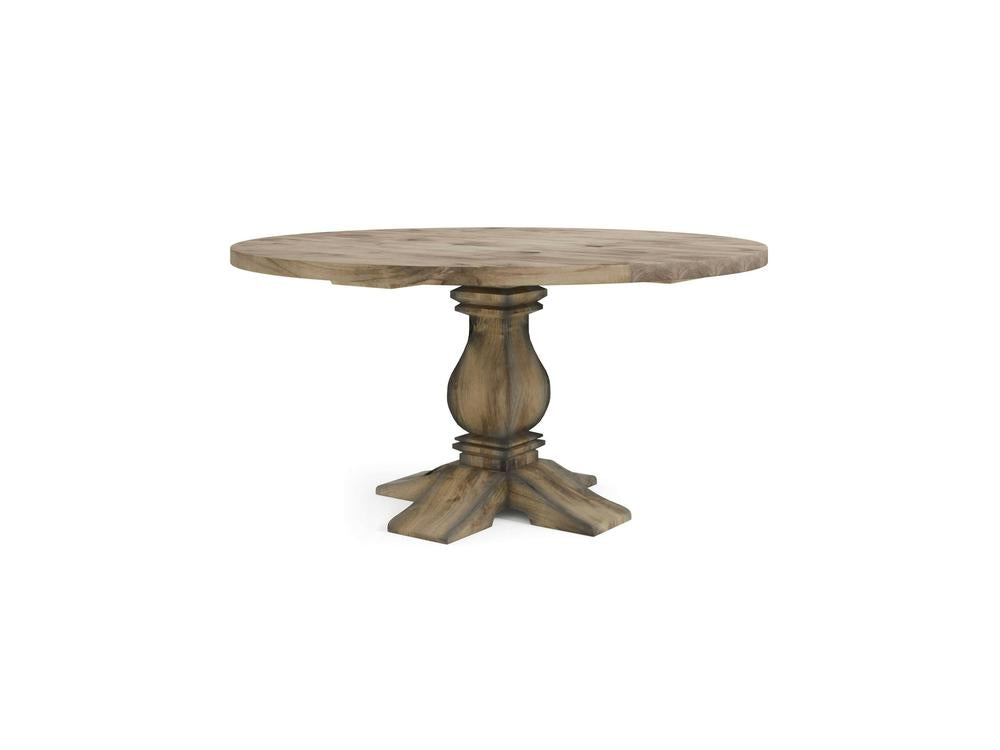Introducing the Heirloom Round Dining Table - Harvest Wheat by James+James. This exquisite round wooden table boasts a rustic finish and a pedestal base. The pedestal is highlighted by a thick, carved central column accented with four sturdy legs extending from the center. The tabletop features a natural wood grain that adds to its weathered look, perfect for any dining area seeking a touch of charm and heritage.
