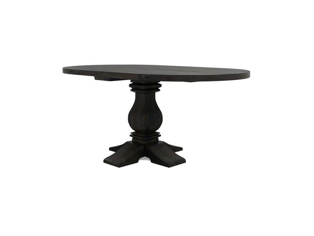 The Heirloom Oval Dining Table - Charred Ember by James+James is a timeless piece featuring an ornate pedestal base with intricate carvings, supported by a sturdy four-legged foundation. Its smooth dark wood finish and classic, elegant design make it a standout addition to any dining space.