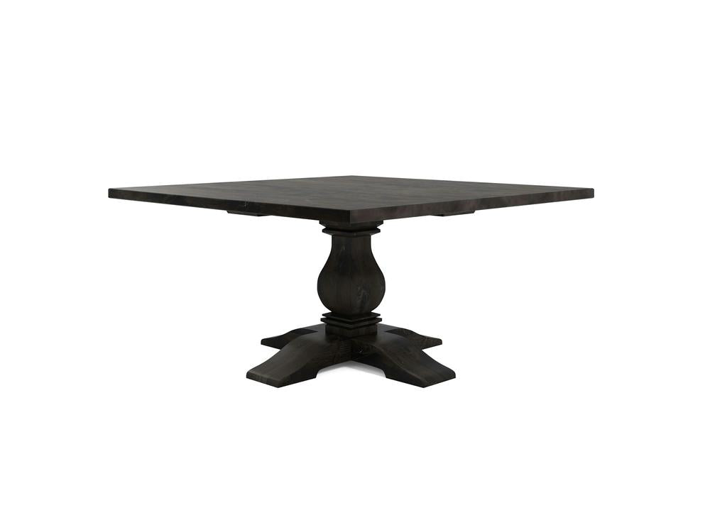 Image of the Heirloom Square Dining Table - Charred Ember by James+James. The dark wood dining table showcases a smooth, flat top and a central pedestal base with intricate carved detailing, extending into four sturdy, splayed feet for support. The design seamlessly blends traditional and contemporary styles.
