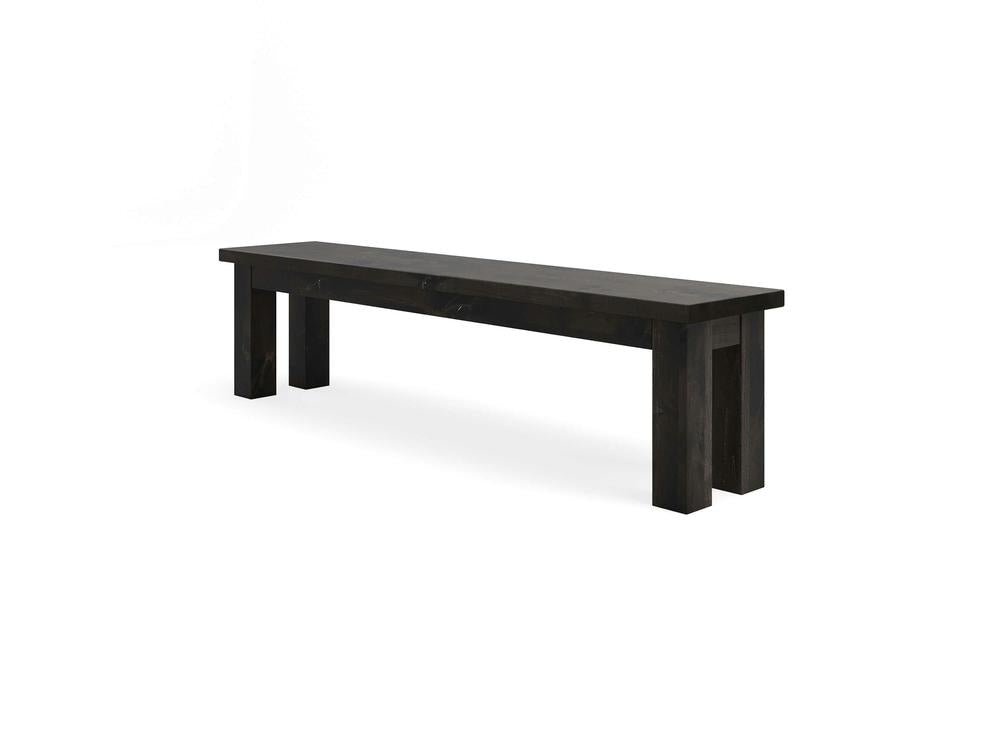 The James+James Farmhouse Bench in Charred Ember on Alder is a long, rectangular black wooden bench with four sturdy legs, displayed against a plain white background.
