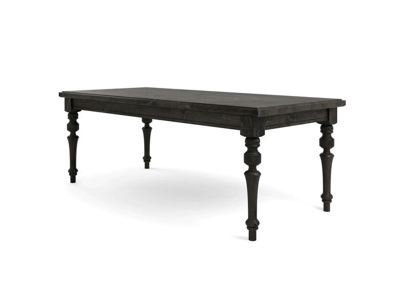 The Allyson Dining Table - Charred Ember by James+James is a dark wooden rectangular table featuring a smooth top surface and intricately carved legs. This classic design includes four sturdy legs, each adorned with detailed, traditional carvings that add an elegant touch to its overall appearance.