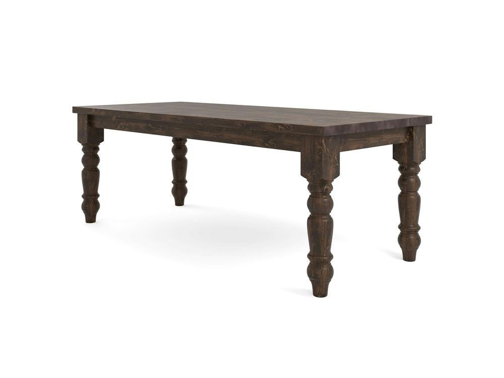 The Baluster Dining Table - Tobacco by James+James is a rectangular wooden piece with a dark finish, featuring a smooth top and four turned, decorative legs. The table has a classic, rustic design and stands alone on a white background.